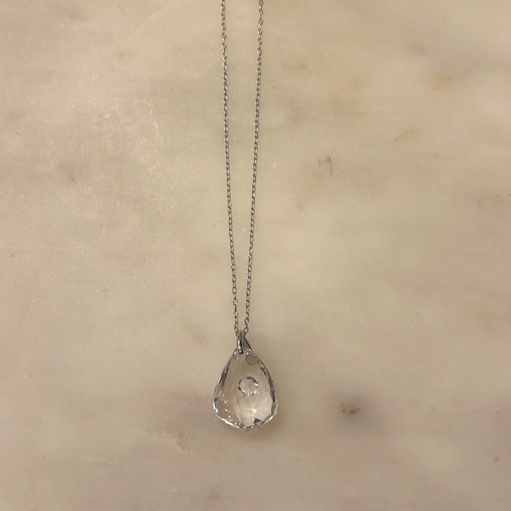 Swarovski crystal pendant with mini crystal within